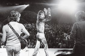 Mick Jagger of the rock and roll band The Rolling Stones as he performed for two capacity crowds, June 25, 1972 in Houston. Jagger (c) takes charge of a crowd of young people and really holds them spellbound for the two hour performance. 