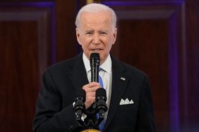 President Joe Biden speaks during a Hanukkah holiday reception in the Grand Foyer of the White House in Washington