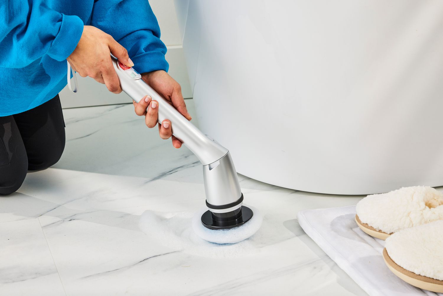 Person cleans a marble floor with a HattyRoom Rechargeable Cordless Electric Spin Scrubber