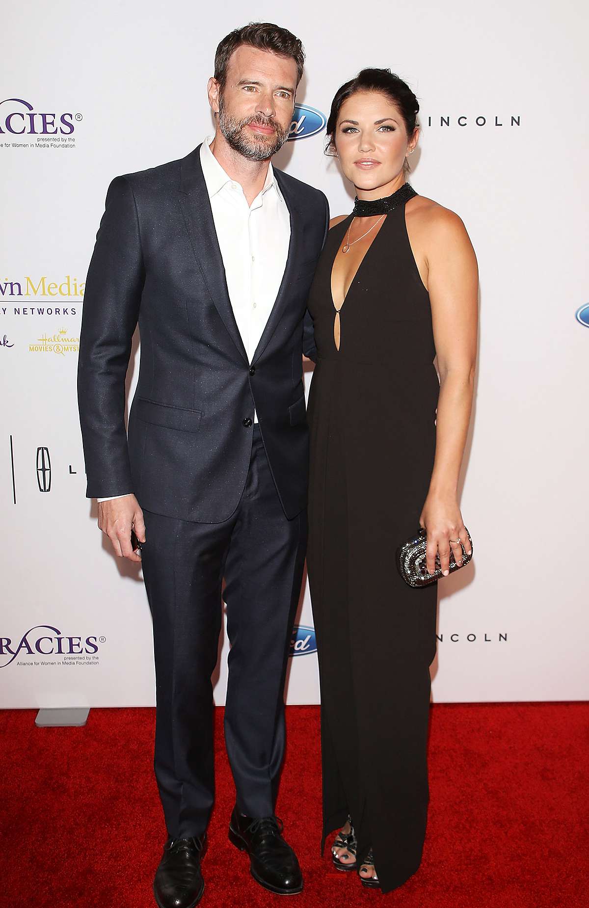 Scott Foley and Marika Dominczyk arrive at the 41st Annual Gracie Awards Gala held at the Beverly Wilshire Four Seasons Hotel on May 24, 2016 in Beverly Hills, California.