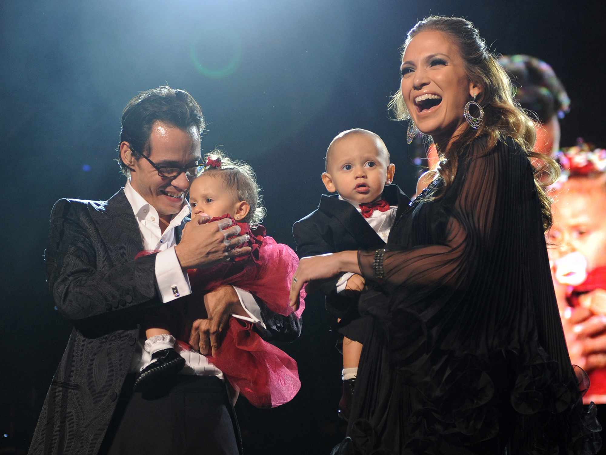 Marc Anthony, Jennifer Lopez and their kids Max and Emme on stage