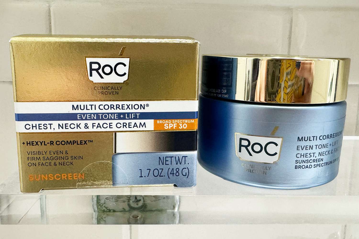 A jar of RoC Multi Correxion 5 in 1 Chest, Neck, and Face Moisturizer Cream with SPF 30 next to its box