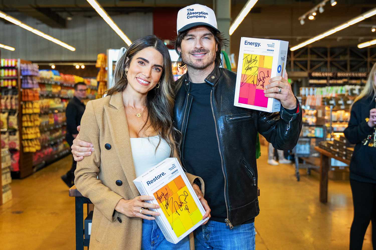 Ian Somerhalder and Nikki Reed celebrate the launch of The Absorption Company, their new supplement company, with fans at Erewhon Calabasas. 