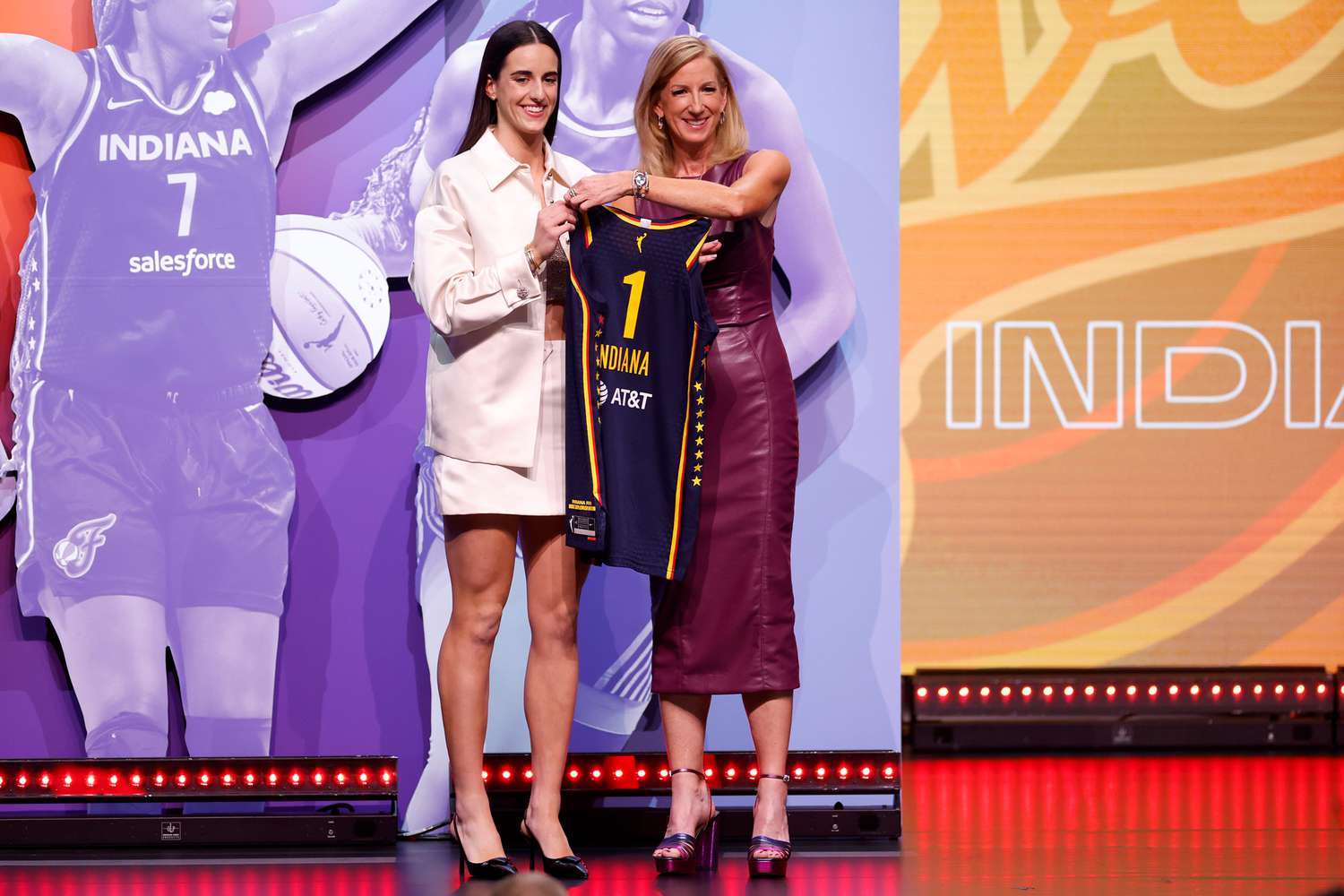 Caitlin Clark poses with WNBA Commissioner Cathy Engelbert