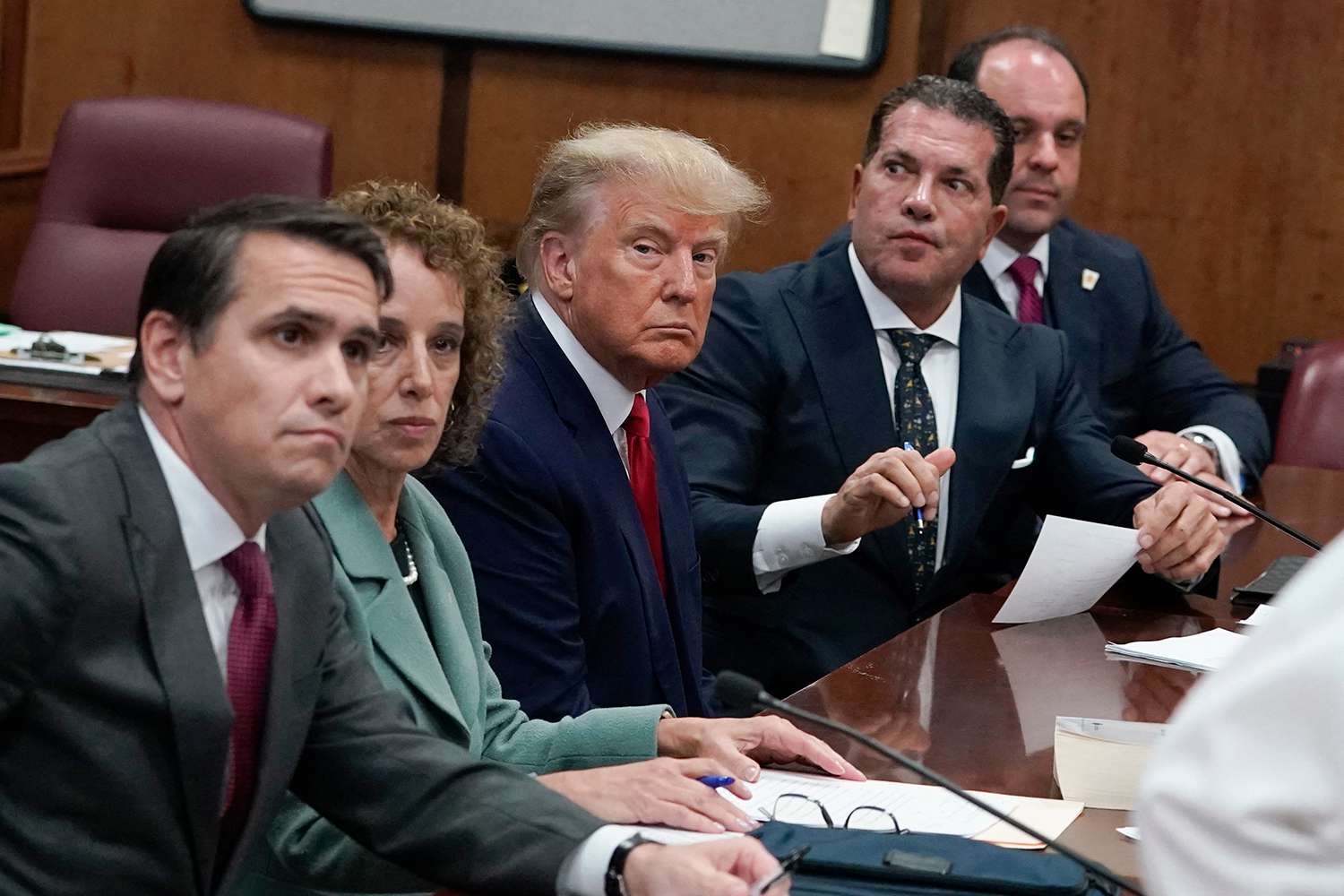 Former US president Donald Trump appears in court at the Manhattan Criminal Court in New York on April 4, 2023. From left: Todd Blanche, Susan Necheles, Donald Trump, Joseph Tacopina and Boris Epshteyn