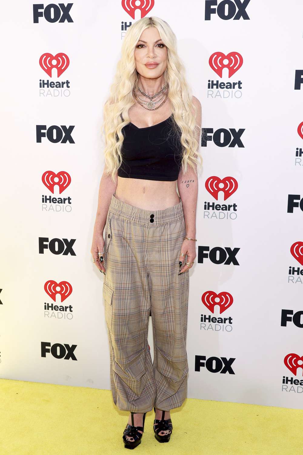 Tori Spelling attends the 2024 iHeartRadio Music Awards at Dolby Theatre in Los Angeles, California on April 01, 2024