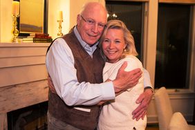 Dick Cheney (L) hugs his daughter Liz Cheney after she won the Republican primar