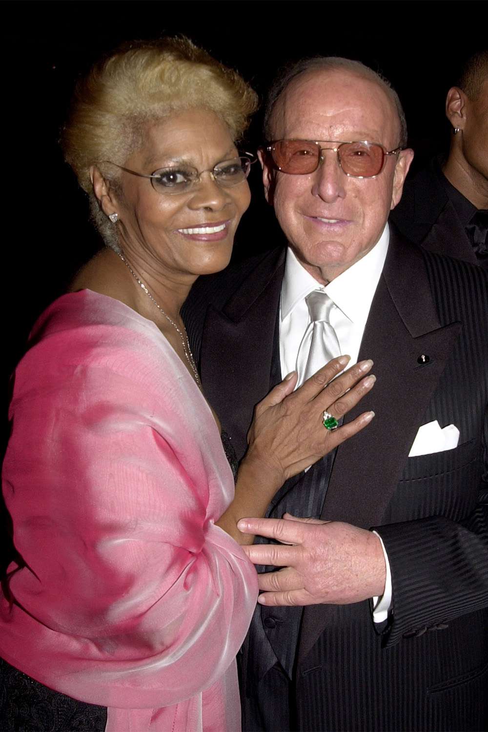 Dionne Warwick and Clive Davis during Chopard Supports the G&P Foundation for Cancer Research Salute to The World of Entertainment and Media at the 2003 Angel Ball at Marriott Marquis in New York City, New York, United States. (Photo by Djamilla Rosa Cochran/WireImage for Chopard)
