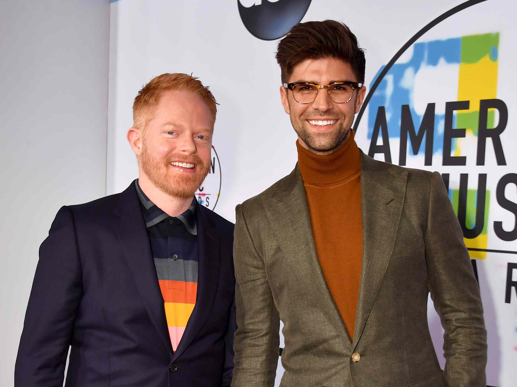 Jesse Tyler Ferguson (L) and Justin Mikita attend the 2017 American Music Awards at Microsoft Theater on November 19, 2017 in Los Angeles, California