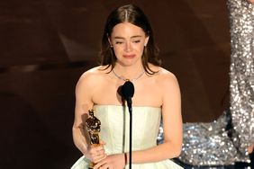 Emma Stone accepts the Lead Actress award for "Poor Things" onstage during the 96th Annual Academy Awards at Dolby Theatre on March 10, 2024 in Hollywood, California