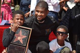 Recording artist Usher and sons Usher Raymond V and Naviyd Ely Raymond attend the ceremony honoring Usher with a star on the Hollywood Walk of Fame on September 7, 2016 in Hollywood, California.