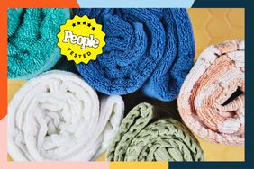 Close up of a variety of bath towels rolled up