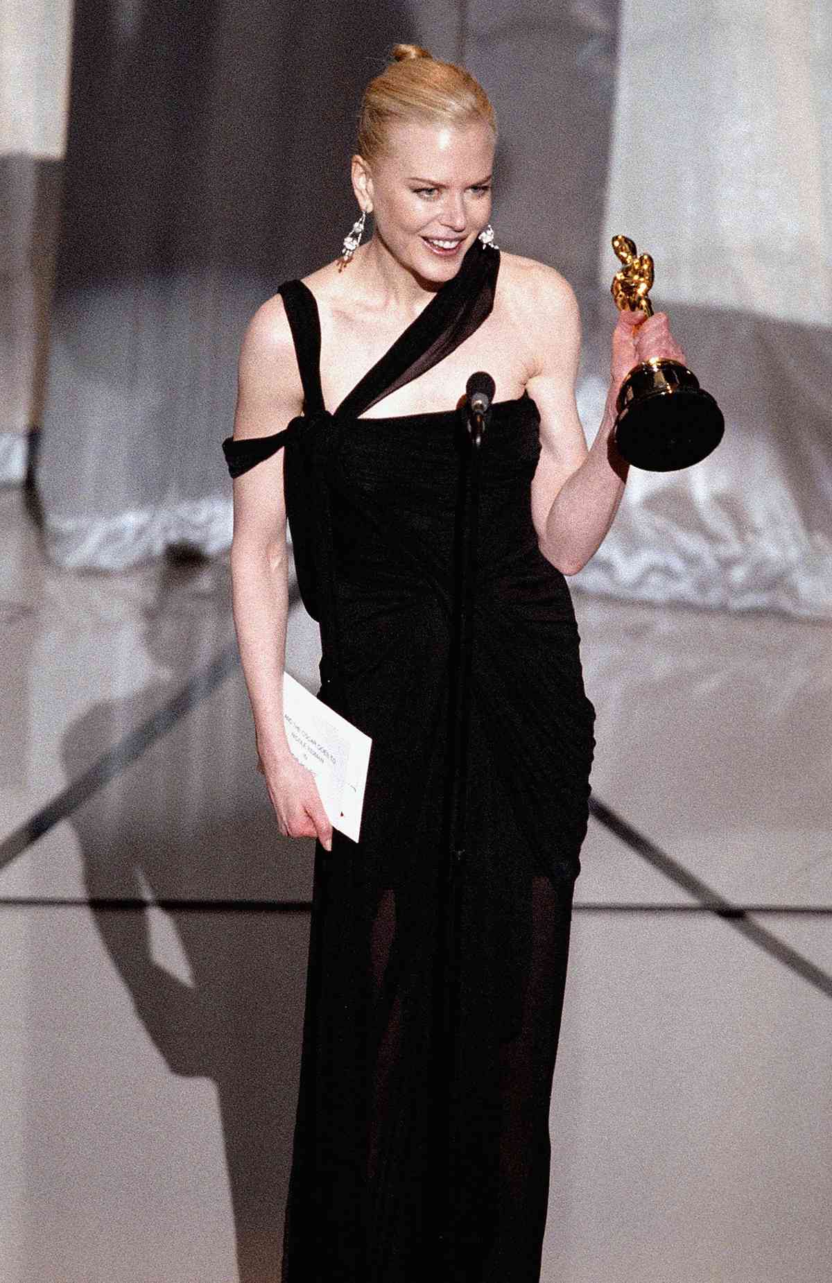 Nicole Kidman accepts her award for Best Actress for her performance in 'The Hours' during the 75th Annual Academy Awards at the Kodak Theater on March 23, 2003 in Hollywood, California. 