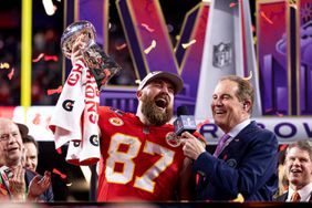 Travis Kelce #87 of the Kansas City Chiefs celebrates with the Vince Lombardi Trophy following the NFL Super Bowl 58 football game between the San Francisco 49ers and the Kansas City Chiefs at Allegiant Stadium on February 11, 2024 in Las Vegas, Nevada
