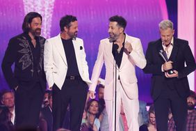Geoff Sprung, Brad Tursi, Matthew Ramsey and Trevor Rosen of Old Dominion wins the award for Group of The Year at the 59th Academy of Country Music Awards from Ford Center at The Star on May 16, 2024 in Frisco, Texas.