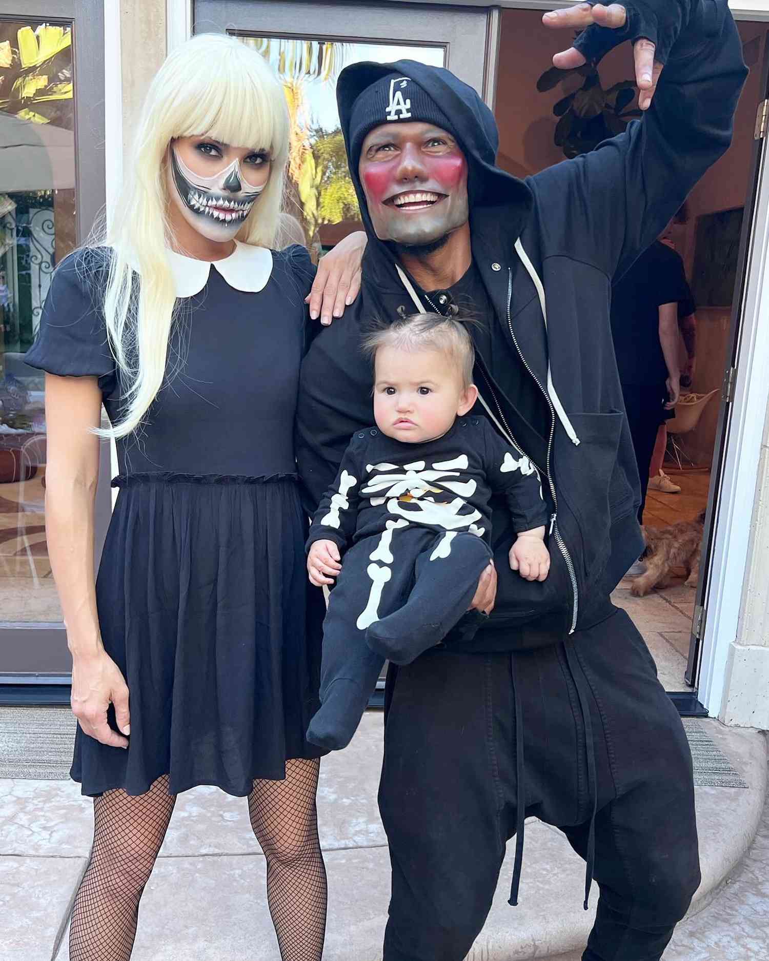Shemar Moore and Jesiree Dizon with their daughter Frankie dressed up fro Halloween.
