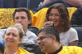 Tom Holland and Zendaya takes in the game between the Los Angeles Lakers and Golden State Warriors during Game 2 of the 2023 NBA Playoffs Western Conference Semifinals