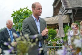 Prince William, Prince of Wales meets members of the kitchen team as he visits The Duchy Of Cornwall Nursery to open The Orangery restaurant on July 10, 2023 in Lostwithiel, United Kingdom. Prince William visits The Duchy Of Cornwall Nursery to open The Orangery restaurant, which has been built as part of a nine-month extension project to create sustainable visitor spaces at the garden centre.