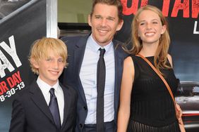 Ethan Hawke and son Roan Thurman-Hawke (L) and daughter Maya Thurman-Hawke (R) arrive at the Los Angeles Premiere "Getaway" at Regency Village Theatre on August 26, 2013 in Westwood, California