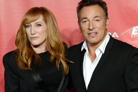 Bruce Springsteen (R) and singer Patti Scialfa arrive at he 2013 MusiCares Person Of The Year Gala Honoring Bruce Springsteen at Los Angeles Convention Center on February 8, 2013 in Los Angeles, California
