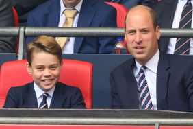 Manchester City v Manchester United v - FA Cup Final - Wembley. Prince George watches the FA Cup Final with Prince William alongside.