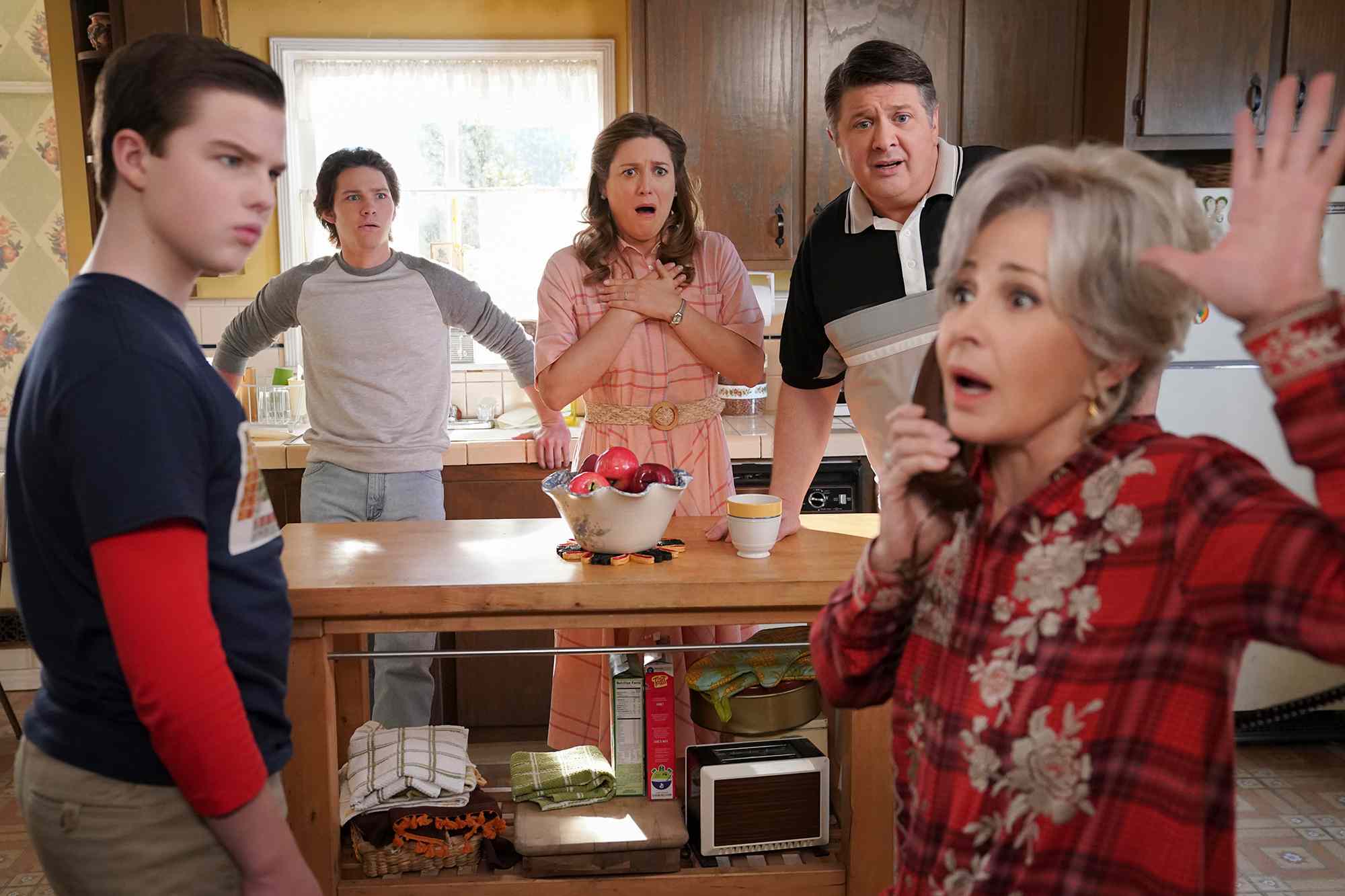 Iain Armitage as Sheldon Cooper, Montana Jordan as Georgie Cooper, Zoe Perry as Mary Cooper, Lance Barber as George Sr., and Annie Potts as Connie 'Meemaw' Tucker in 'Young Sheldon'. 