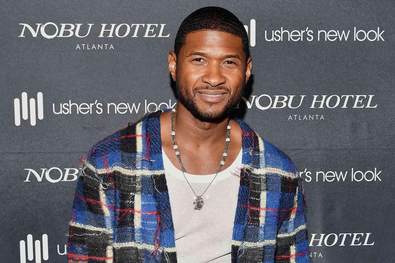 Usher attends Usher's New Look presents "2023 Disruptivator Summit: Be Your Own Superhero" on July 19, 2023 in Atlanta, Georgia
