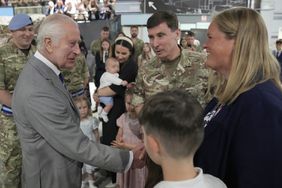 King Charles III meets staff members and their families at the Army Aviation Centre 