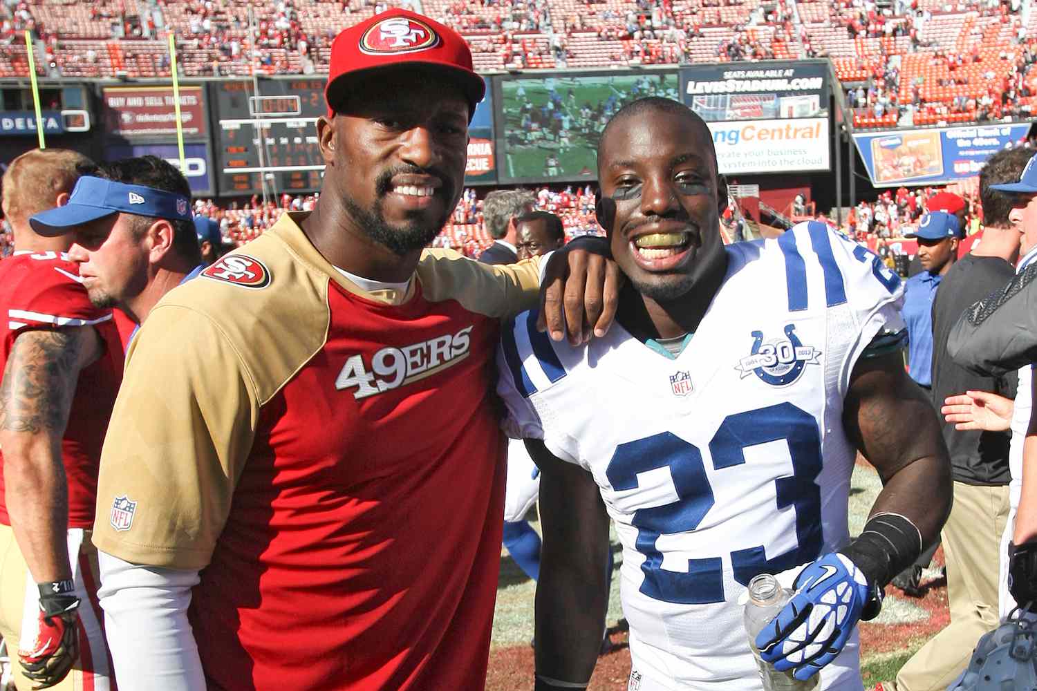 Vernon Davis #85 of the San Francisco 49ers stands with his brother Vontae Davis #23 of the Indianapolis Colts following the game at Candlestick Park on September 22, 2013 in San Francisco, California. The Colts defeated the 49ers 27-7.