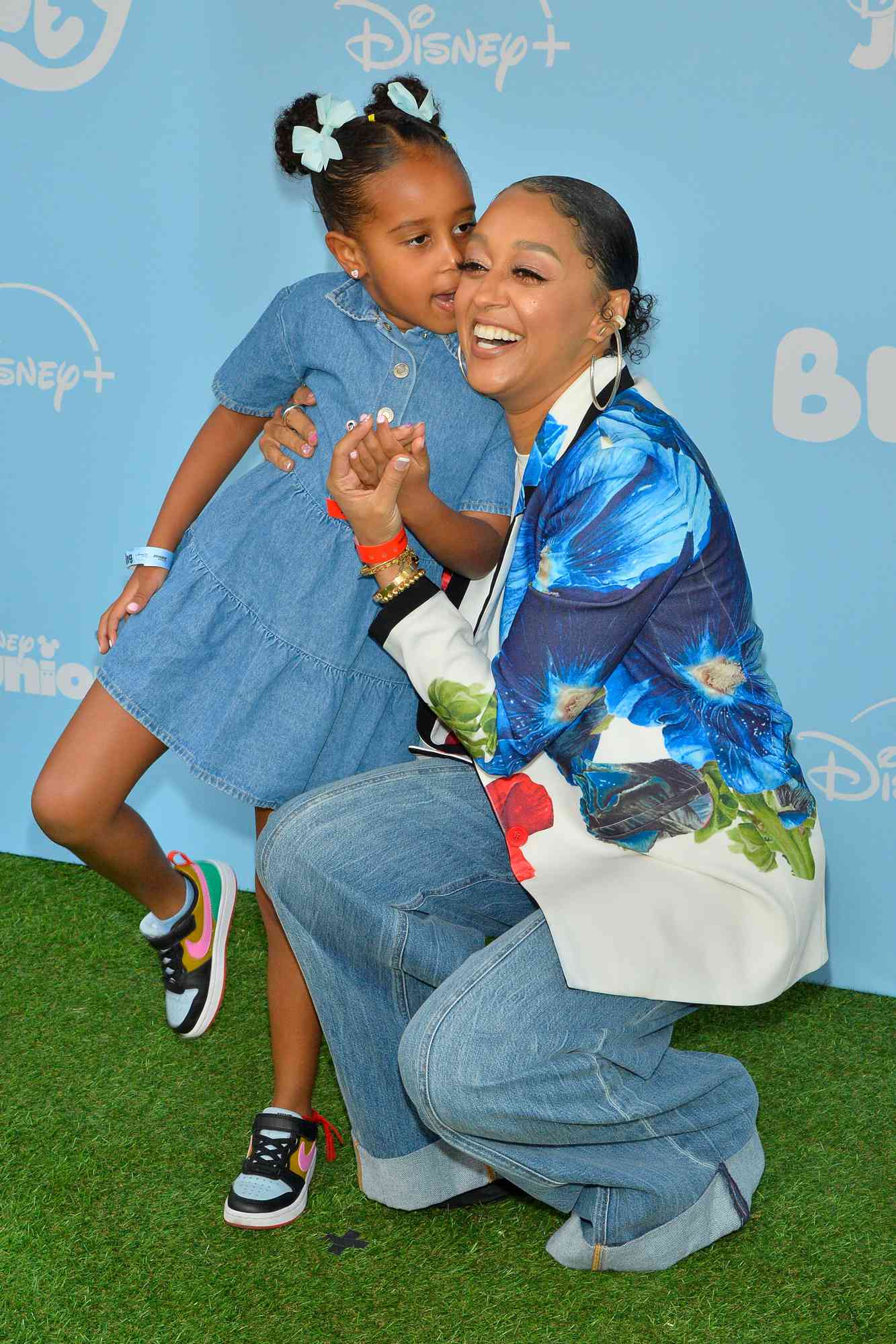 Tia Mowry and Daughter Cairo arrive at Los Angeles Bluey "The Sign" Premiere Party