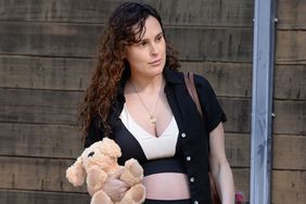Rumer Willis leaving a workout class, carrying her new Warmies while showing off her baby bump wearing sustainable brand Losano
