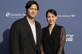 Shohei Ohtani (L) and Mamiko Ohtani arrive at the Los Angeles Dodgers Foundation's 2024 Blue Diamond Gala at Dodger Stadium on May 02, 2024 in Los Angeles, California. 