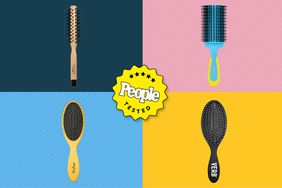 Four hair brushes arranged on a colorful background
