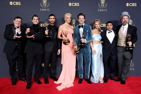 Jeremy Swift, Phil Dunster, Brett Goldstein, Hannah Waddingham, Jason Sudeikis, Juno Temple, Nick Mohammed, and Brendan Hunt pose in the press room during the 73rd Primetime Emmy Awards at L.A. LIVE on September 19, 2021 in Los Angeles, California