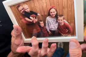 From left, Brian Anthony Nelson II, Kurgan Nelson, Ragnar Nelson, Brantley Nelson and Vegeta Nelson are seen in a framed photograph in their grandparents apartment in Tulsa, Okla., on Friday, Oct. 28, 2022.