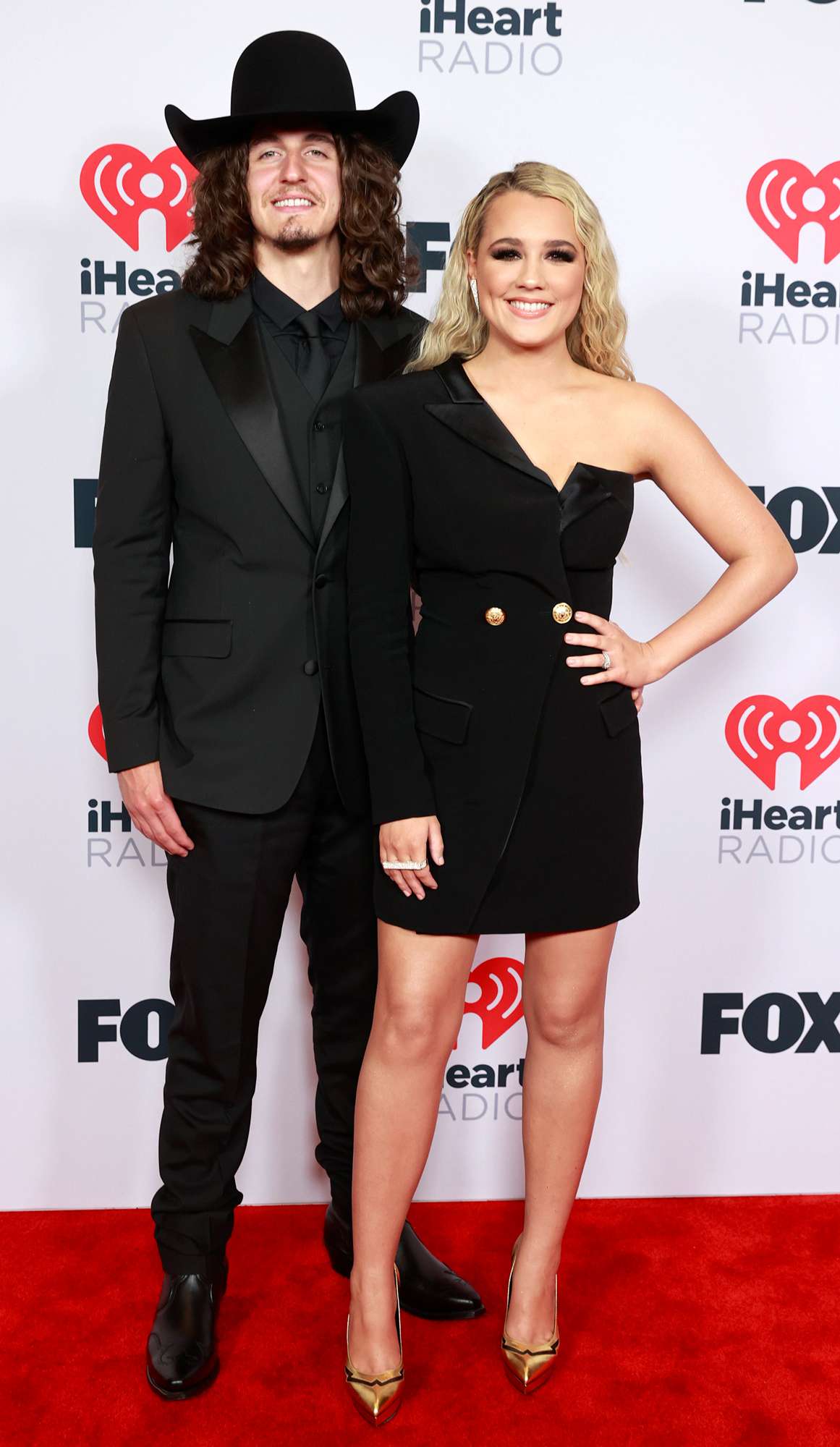 Cade Foehner (L) and Gabby Barrett attend the 2021 iHeartRadio Music Awards at The Dolby Theatre in Los Angeles, California, which was broadcast live on FOX on May 27, 2021