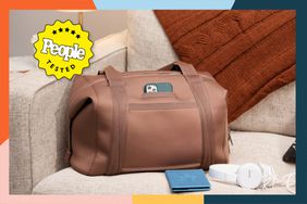Carry All Bag set on a beige couch