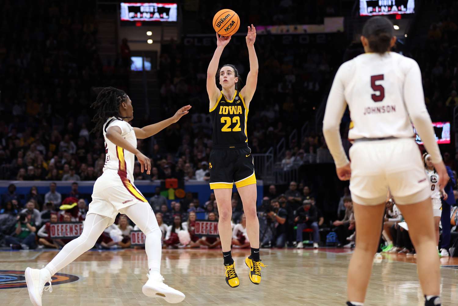 Caitlin Clark #22 of the Iowa Hawkeyes shoots over Ashlyn Watkins #2 of the South Carolina Gamecocks in the second half during the 2024 NCAA Women's Basketball Tournament National Championship at Rocket Mortgage FieldHouse on April 07, 2024 in Cleveland, Ohio. (