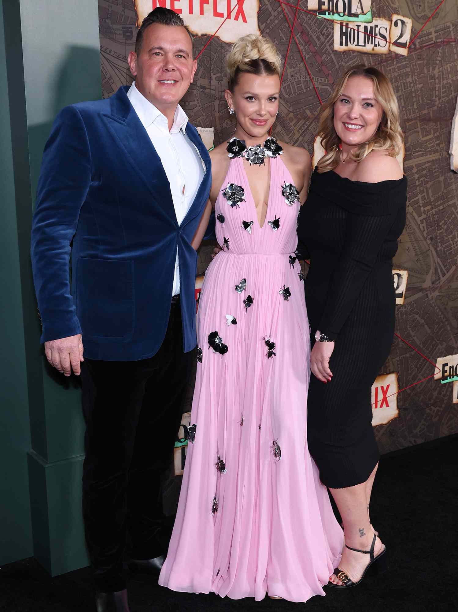 Robert Brown, Millie Bobby Brown, and Paige Brown attend the premiere of 'Enola Holmes 2'.