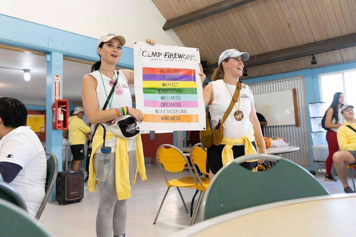 Katy Perry and her sister Angela cofounded Camp Firework, which gives underserved kids access the arts. Katy and Angela with the pillars: Nov 2022 Camp Firework - Catalina Island 