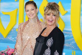 US actress Kate Hudson (L) and her mom actress Goldie Hawn (R) arrive for Netflix's "Glass Onion: A Knives Out Mystery" premiere at the Academy Museum of Motion Pictures in Los Angeles, November 14, 2022. (Photo by Juan Pablo Rico / AFP) (Photo by JUAN PABLO RICO/AFP via Getty Images)