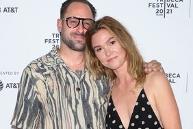 Julia Stiles (R) and husband Preston Cook attend the "The God Committee" premiere during the 2021 Tribeca Festival at Brooklyn Commons at MetroTech on Ju 2021 in New York City