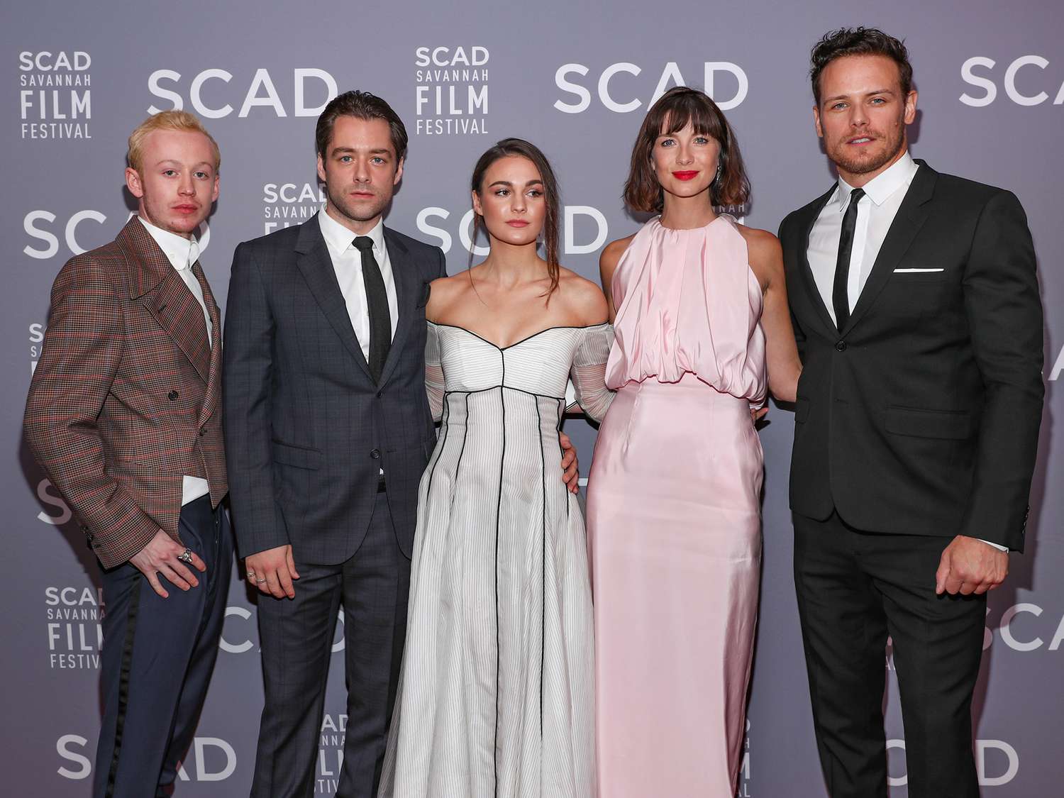 John Bell, Richard Rankin, Sophie Skelton, Caitriona Balfe, and Sam Heughan attend the 21st SCAD Savannah Film Festival Red Carpet for "Outlander" Season Four