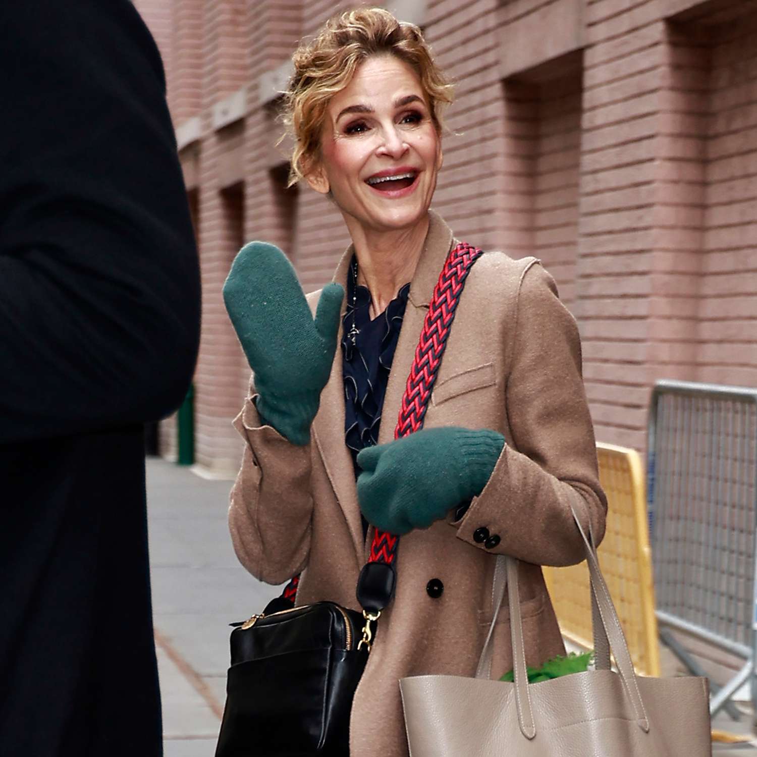 Kyra Sedgwick exits The View Talk Show Studios in New York City. The 58 year old American actress wore a beige jacket, black blouse, baggy trousers, and white trainers.