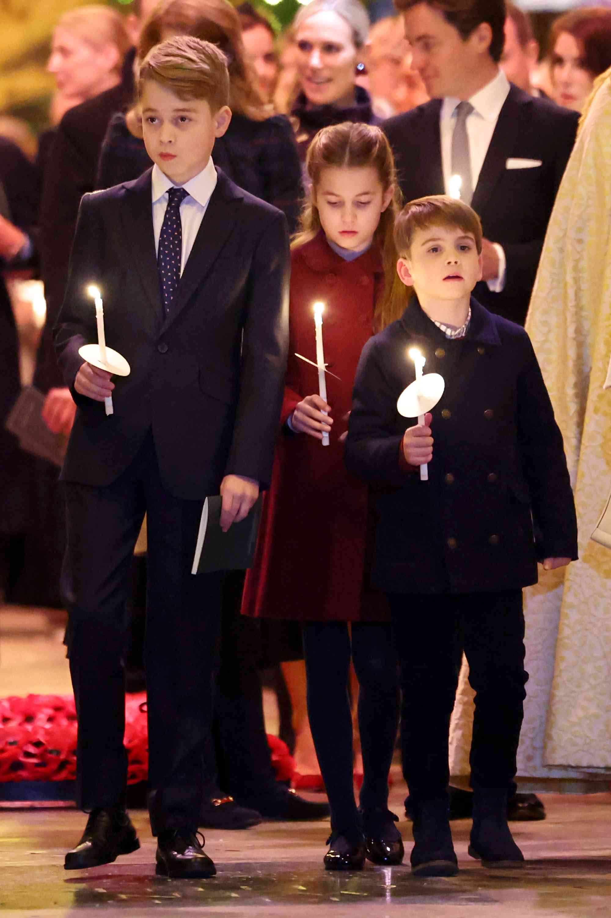 Prince George of Wales, Princess Charlotte of Wales and Prince Louis of Wales attend The "Together At Christmas" Carol Service at Westminster Abbey on December 08, 2023 in London, England.