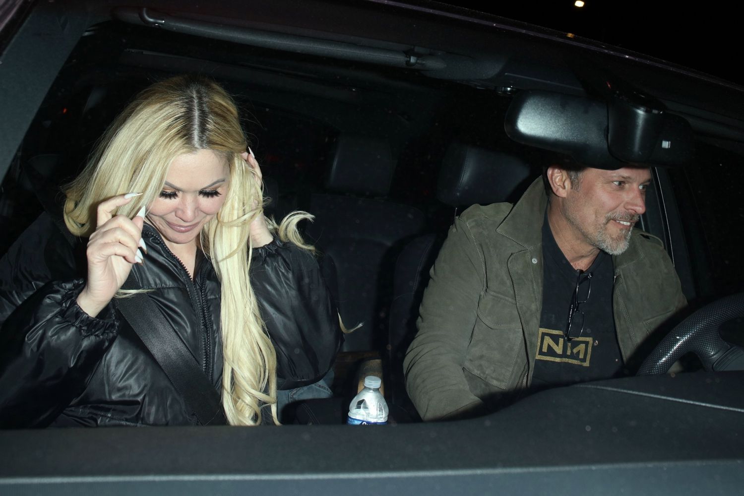 Shanna Moakler and Greg Vaughan were seen leaving The Black Keys' album release party, radiating style in her evening attire.