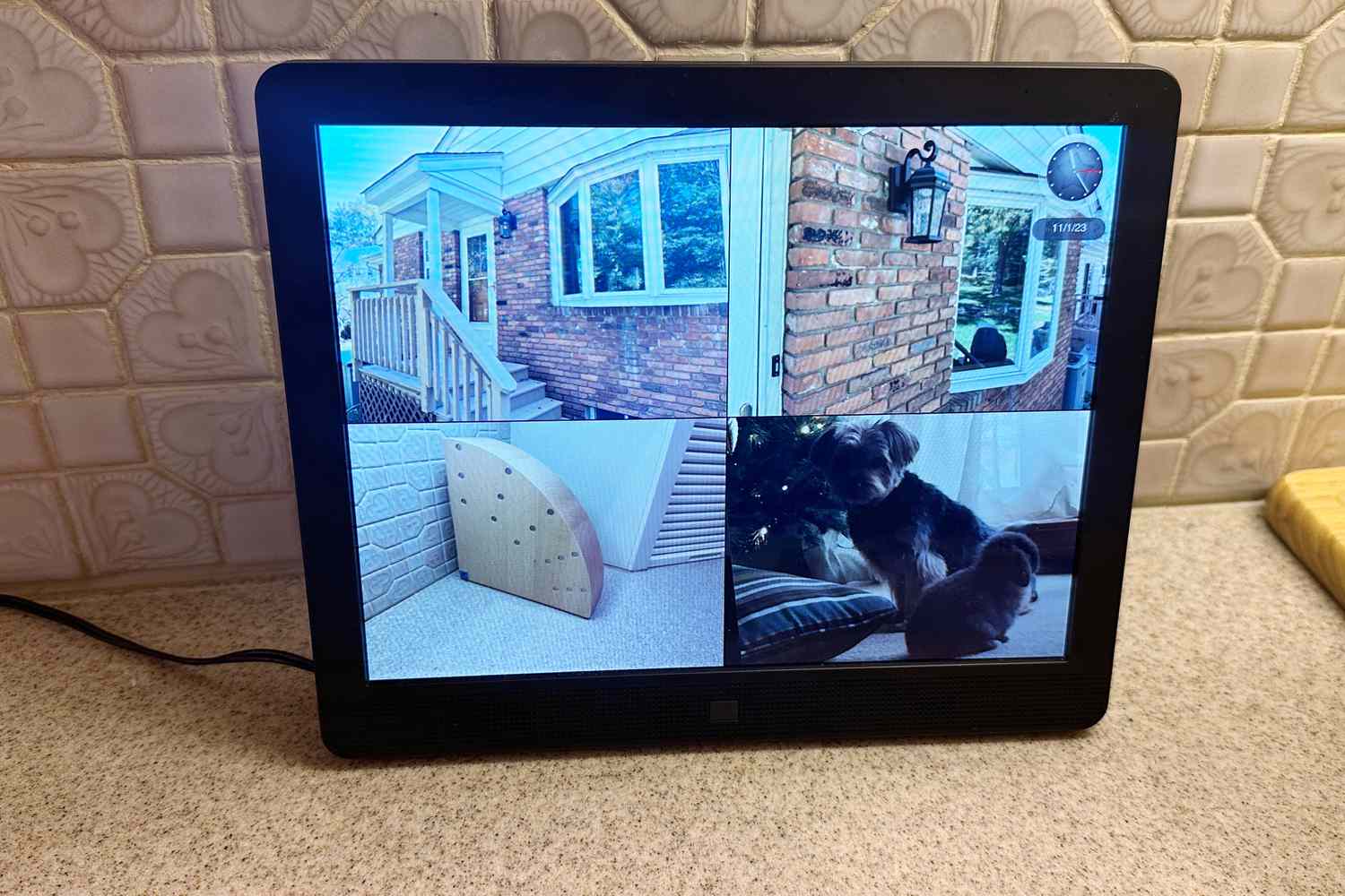 Pix-Star 10 inch WiFi Digital Picture Frame on a kitchen counter displaying 4 pictures