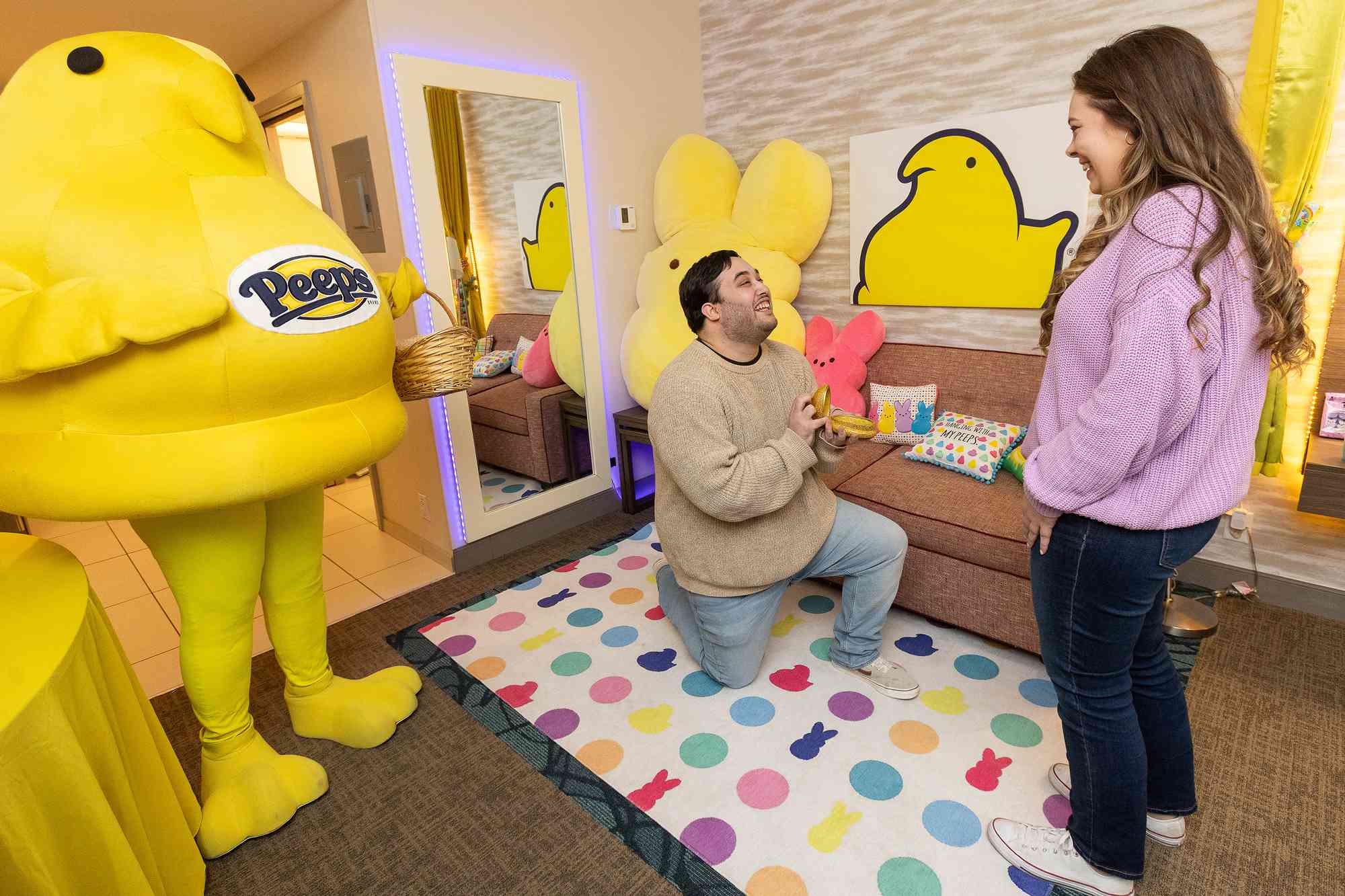 Matthew Rivera and Carly Jessup along with the PEEPS Chick Mascot for a once-in-a-lifetime marriage proposal on Monday, March 25, 2024 in Easton, Pa.