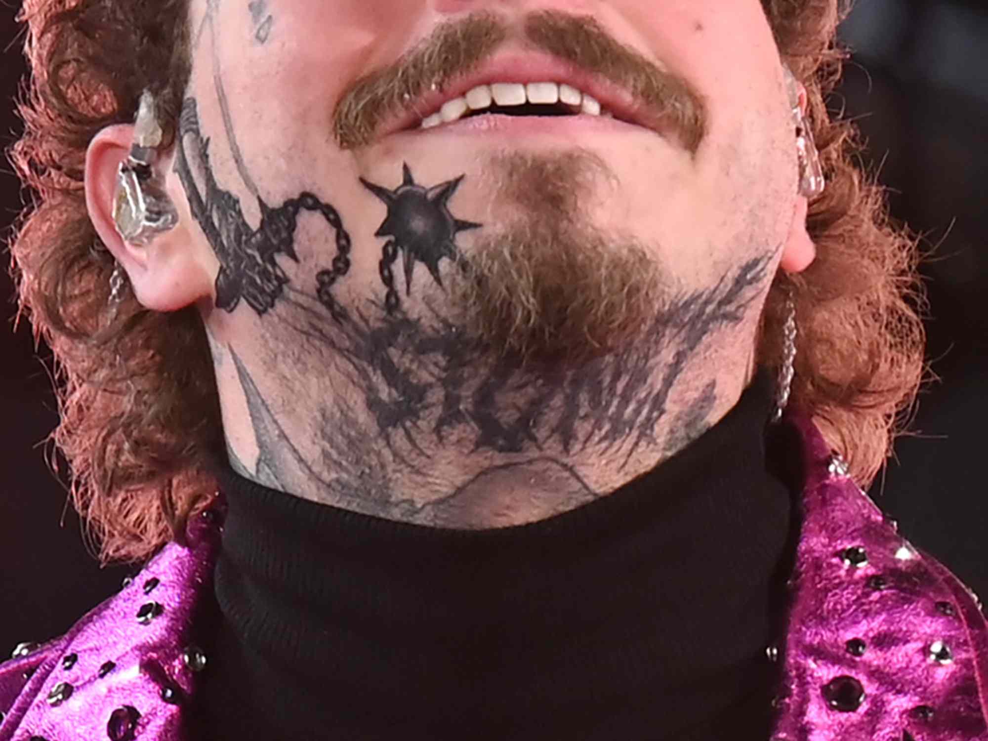 Post Malone (tattoo detail) performs during the Times Square New Year's Eve 2020 Celebration on December 31, 2019 in New York City.