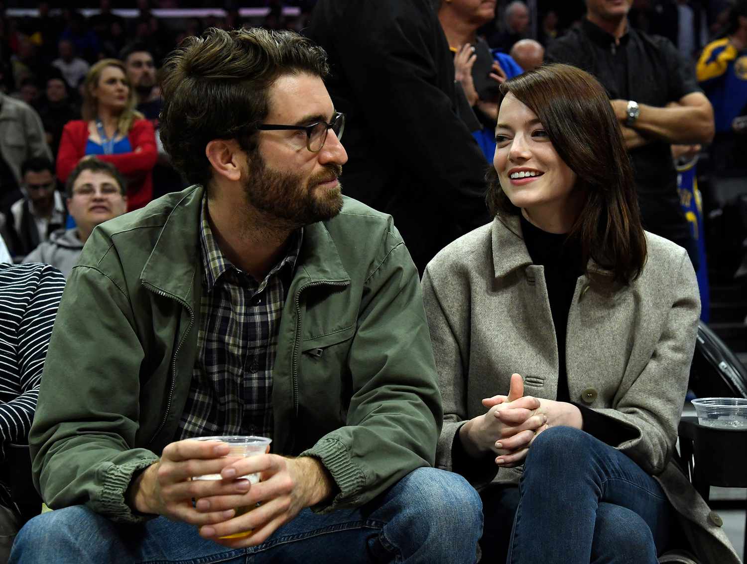 Emma Stone and Dave McCary attend the Golden State Warriors and Los Angeles Clippers basketball game at Staples Center on January 18, 2019 in Los Angeles, California. NOTE TO USER: User expressly acknowledges and agrees that, by downloading and or using this photograph, User is consenting to the terms and conditions of the Getty Images License Agreement